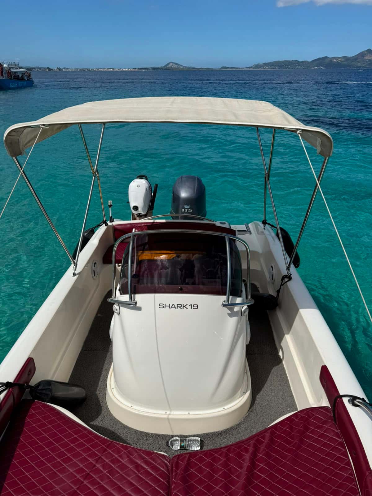 On deck aboard Mateo, console and seating
