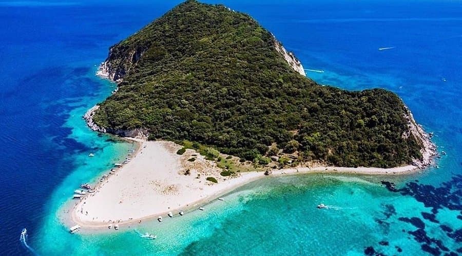 Marathonisi Turtle Island and its sandy beach from above