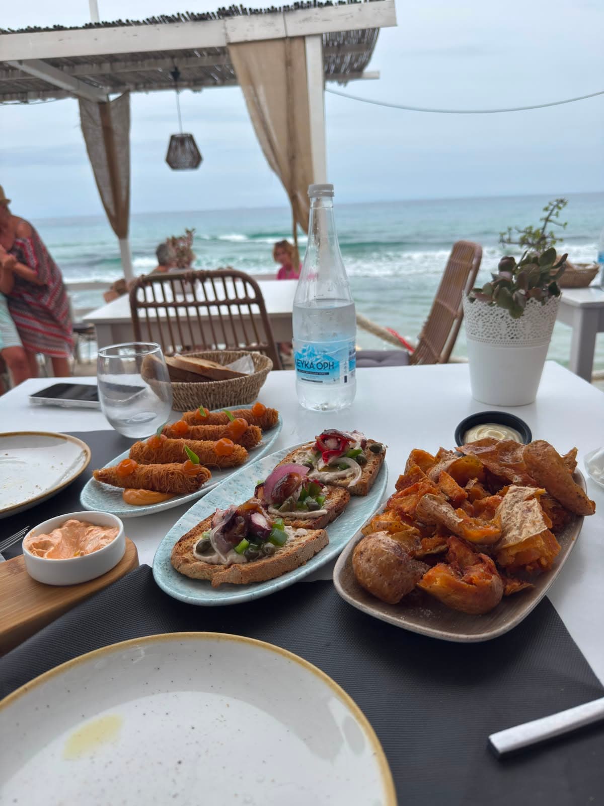 Seaside dining table set for a Zakynthos restaurant reservation